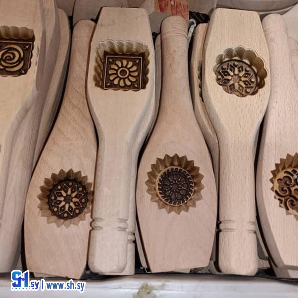 قوالب معمول (النجار وعقاد لتجارة الأدوات المنزلية)