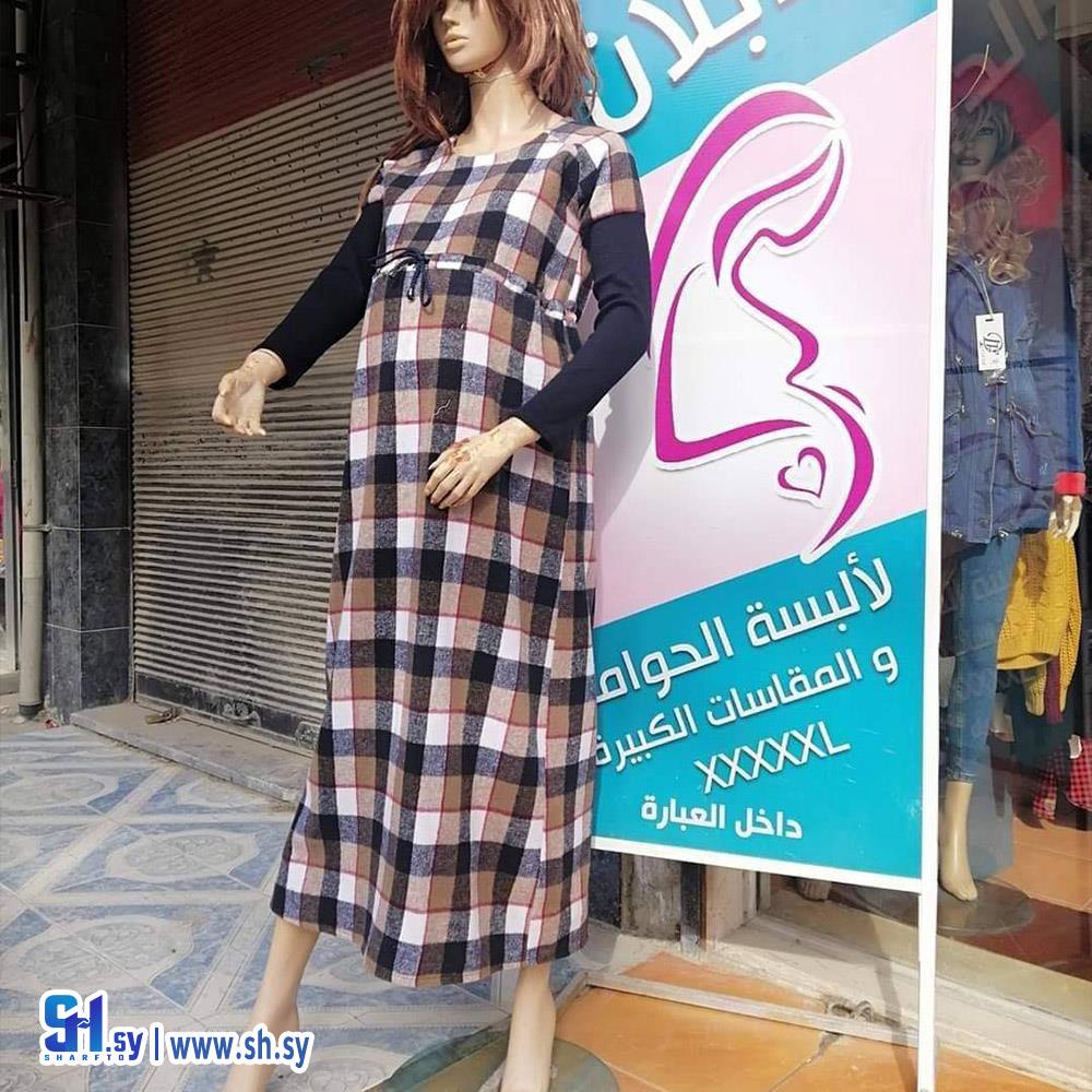 فستان حامل كاروه (أزياء الدبلان)