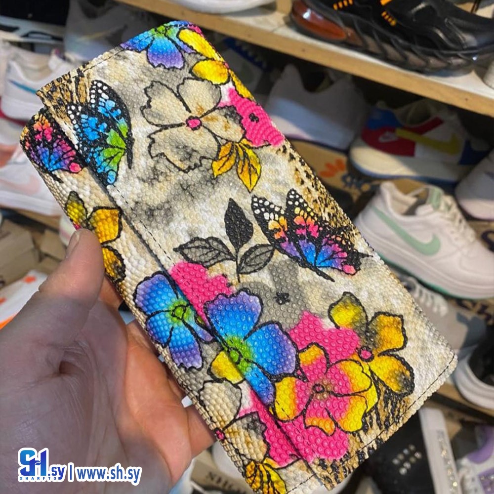 جزدان نسائي مورد (أحذية الخير)