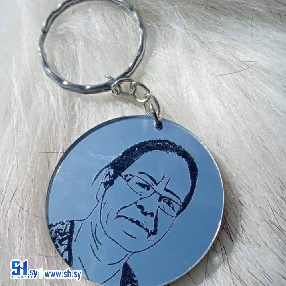 سلسلة مفاتيح صور كحت على البلكسي (Nour Accessories)
