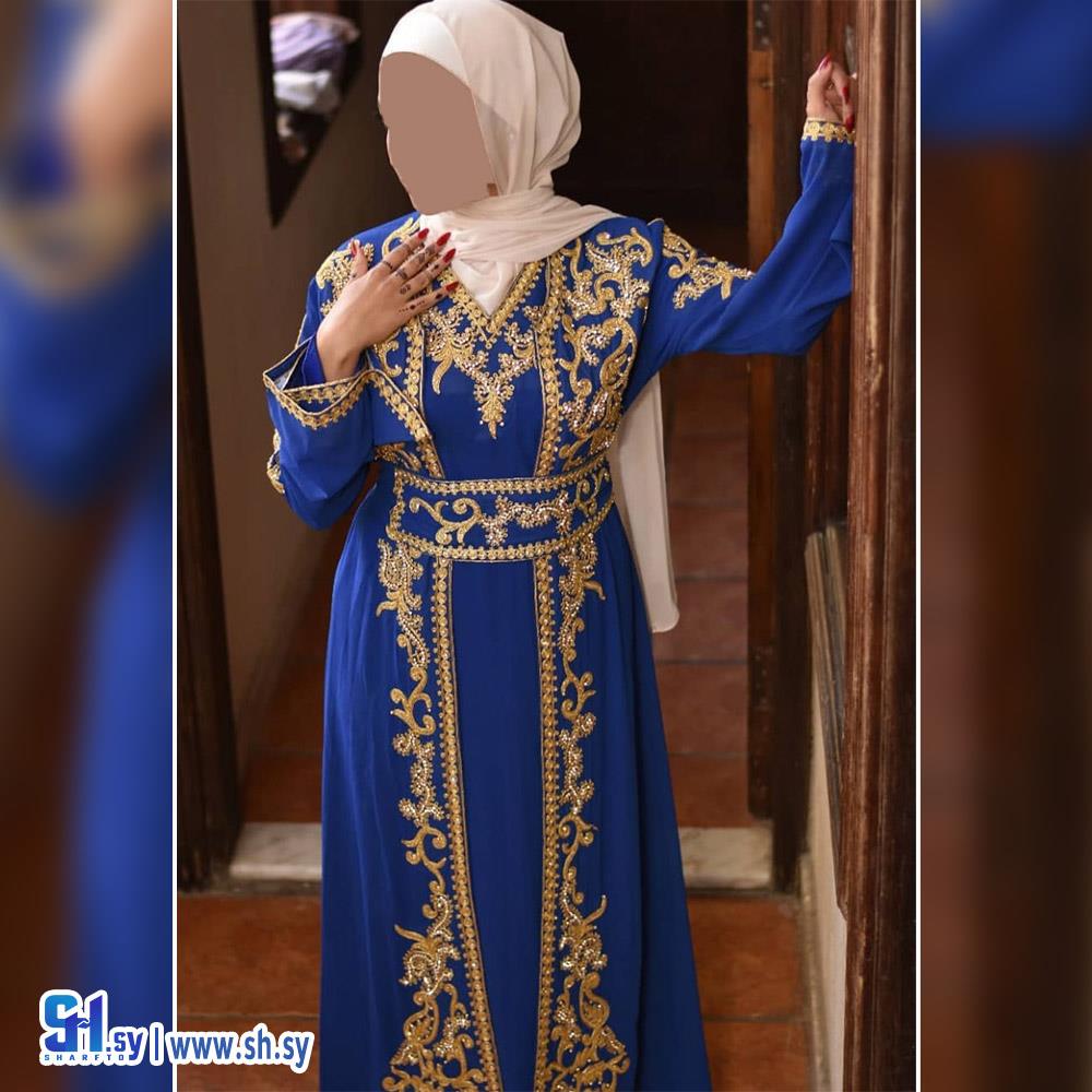 عباية قطعتين بريم وشك يدوي (معرض النجمة الذهبية)