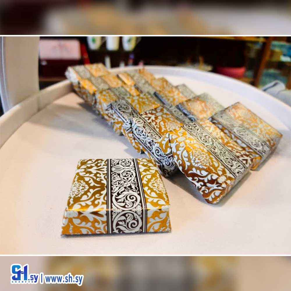 شوكولا الحليب مع حبات اللوز المحمص (سكر نبات)