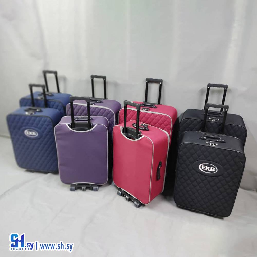 حقيبة سفر موديل  تطريز مثلثات (محمد عيد قدورة)