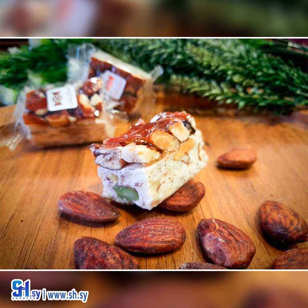 من وسلوى مع اللوز والهيل (سكر نبات)