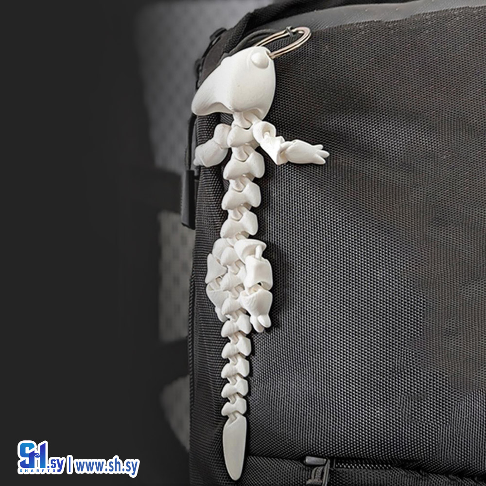 سلسلة مفاتيح على شكل تنين مفصلي (مركز مدني للطباعة 3d)