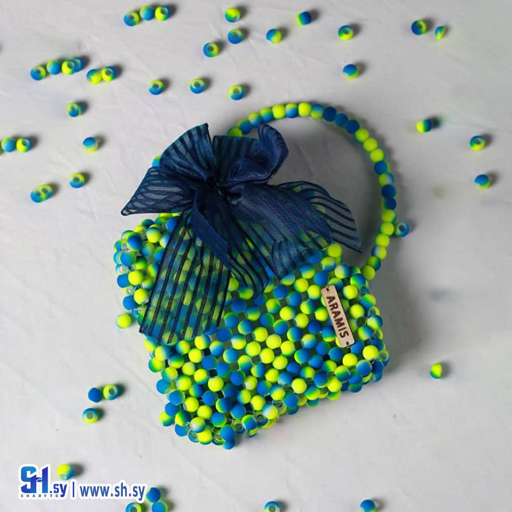 حقيبة يد بناتية لؤلؤ لون كحلي وفسفوري (اراميس)