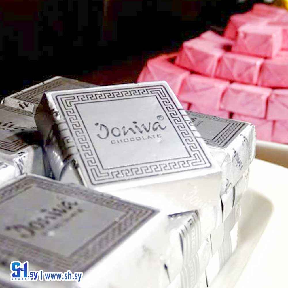 شوكولا الحليب مع مكسرات اللوز (سكر نبات)