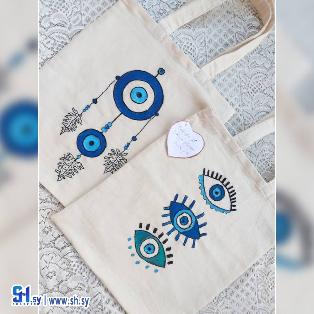 حقيبة يد نسائية موديل العين الزرقاء (الغصن العتيق)