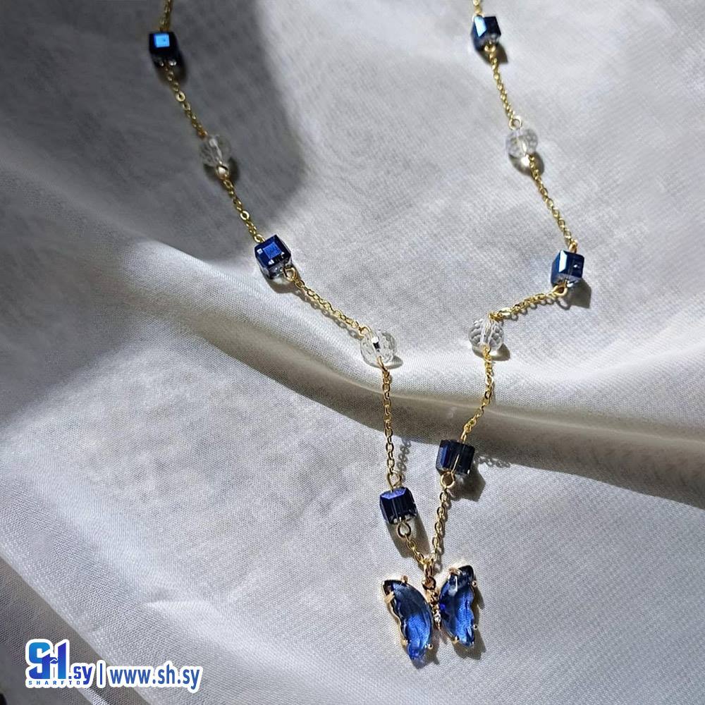 قلادة الفراشة المطلية بماء الدهب (Nour Accessories)