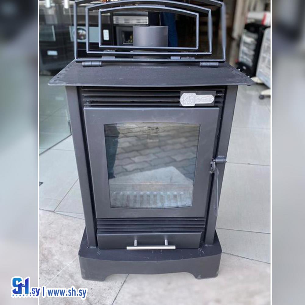 مدفأة حطب الكترو(الحافظ والحلواني)