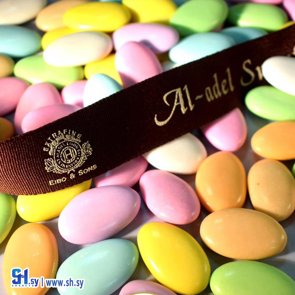 بوب الشوكولا بشكل اللوزة مغطى بغلاف سكري (العدل كو)