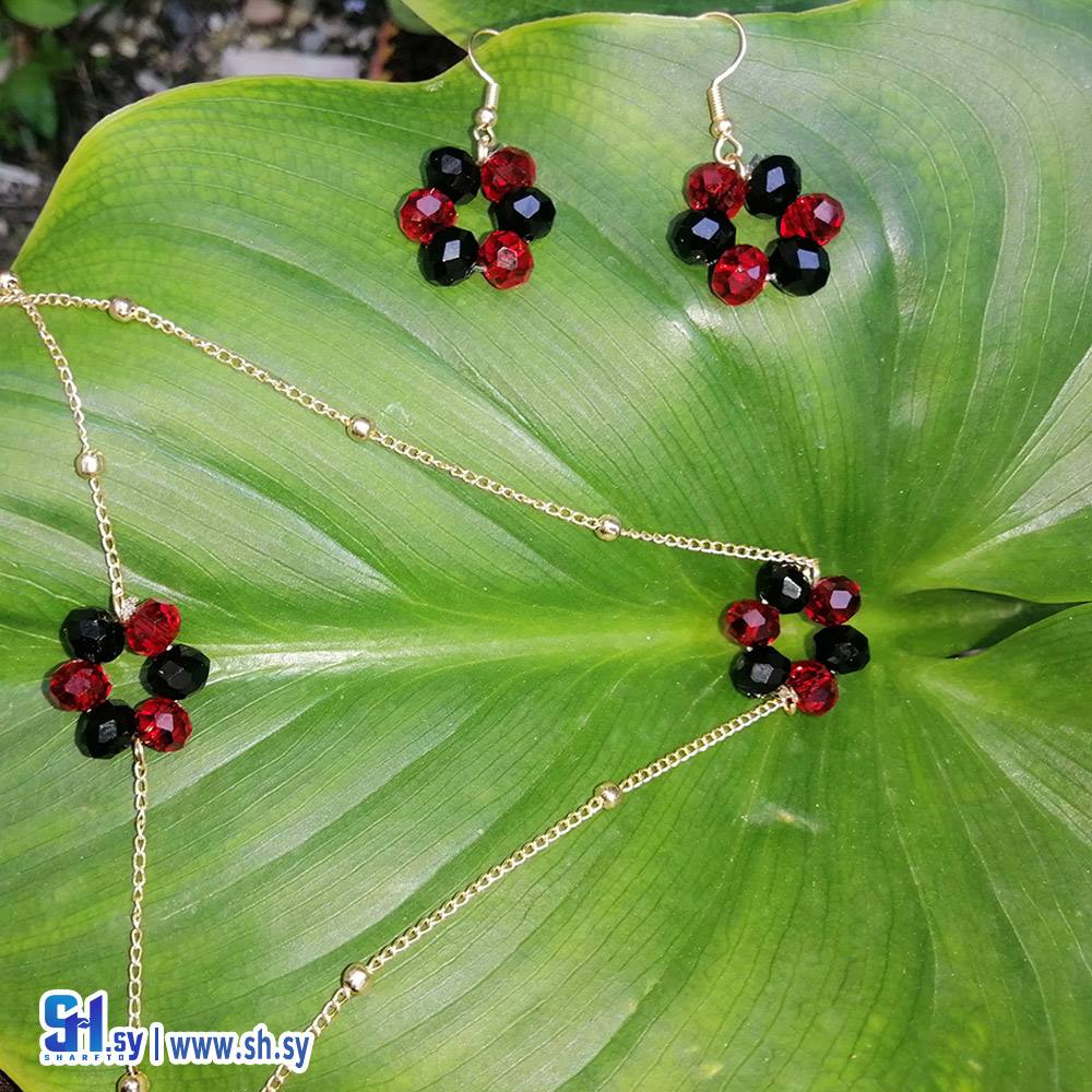 طقم كريستال مطلي بمية الدهب (Nour Accessories)