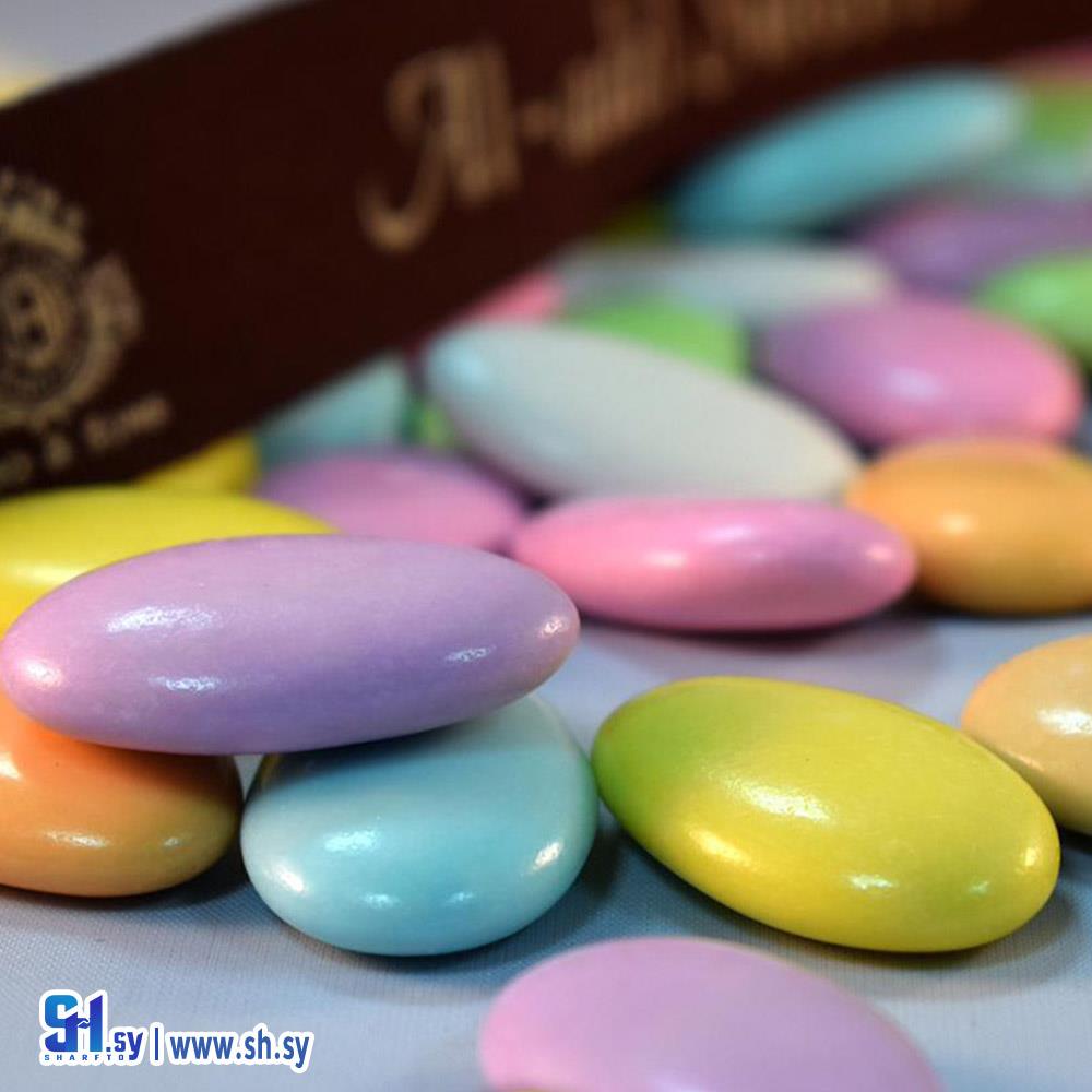 حبوب الشوكولا بشكل اللوزة مغطى بغلاف سكري (العدل كو)