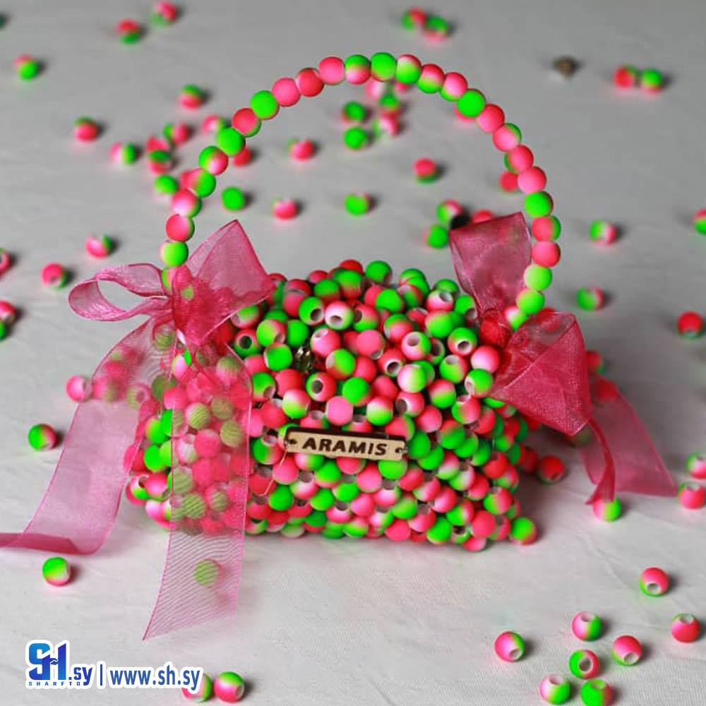 حقيبة لؤلؤ بناتية لون فوشي و أخضر (اراميس)